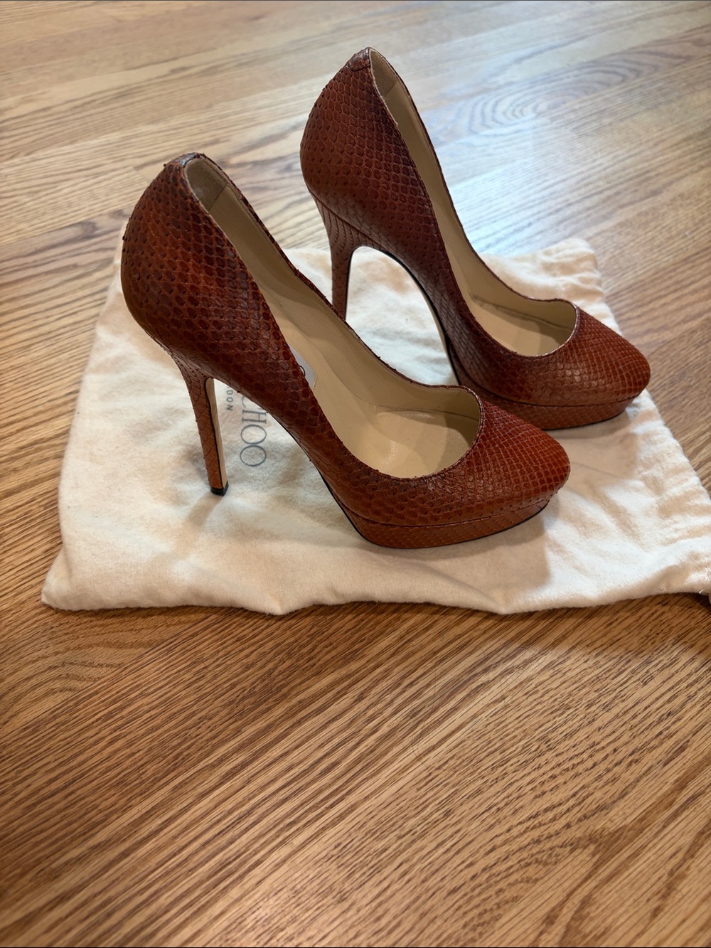 Jimmy Choo Snakeskin Round Toe Pumps